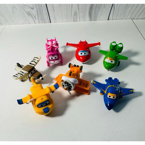 Super Wings Transforming Planes 2" Mini Airplanes Helicopter Vehicles Lot of 7 - Picture 1 of 3